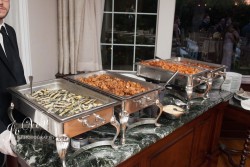 an assortment of food at a wedding reception