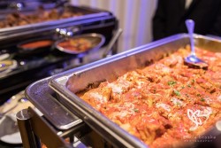 an assortment of food at a wedding reception