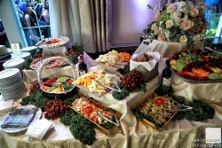an assortment of food at a wedding reception