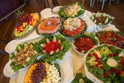 an assortment of food at a wedding reception