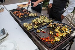 an assortment of food at a wedding reception