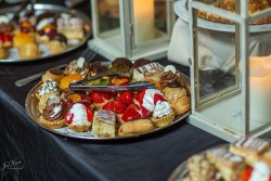 an assortment of pastries at a wedding reception