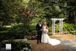 bride and groom outside, in the reception area
